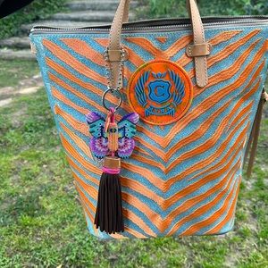 Consuela tote with optional cross body strap, back strap (removable) and handle